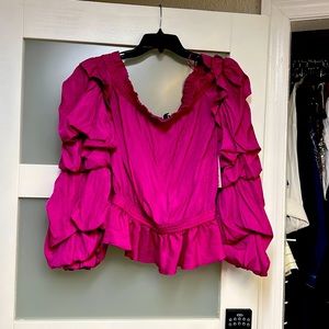 Pink color top that can be worn on and off your shoulders